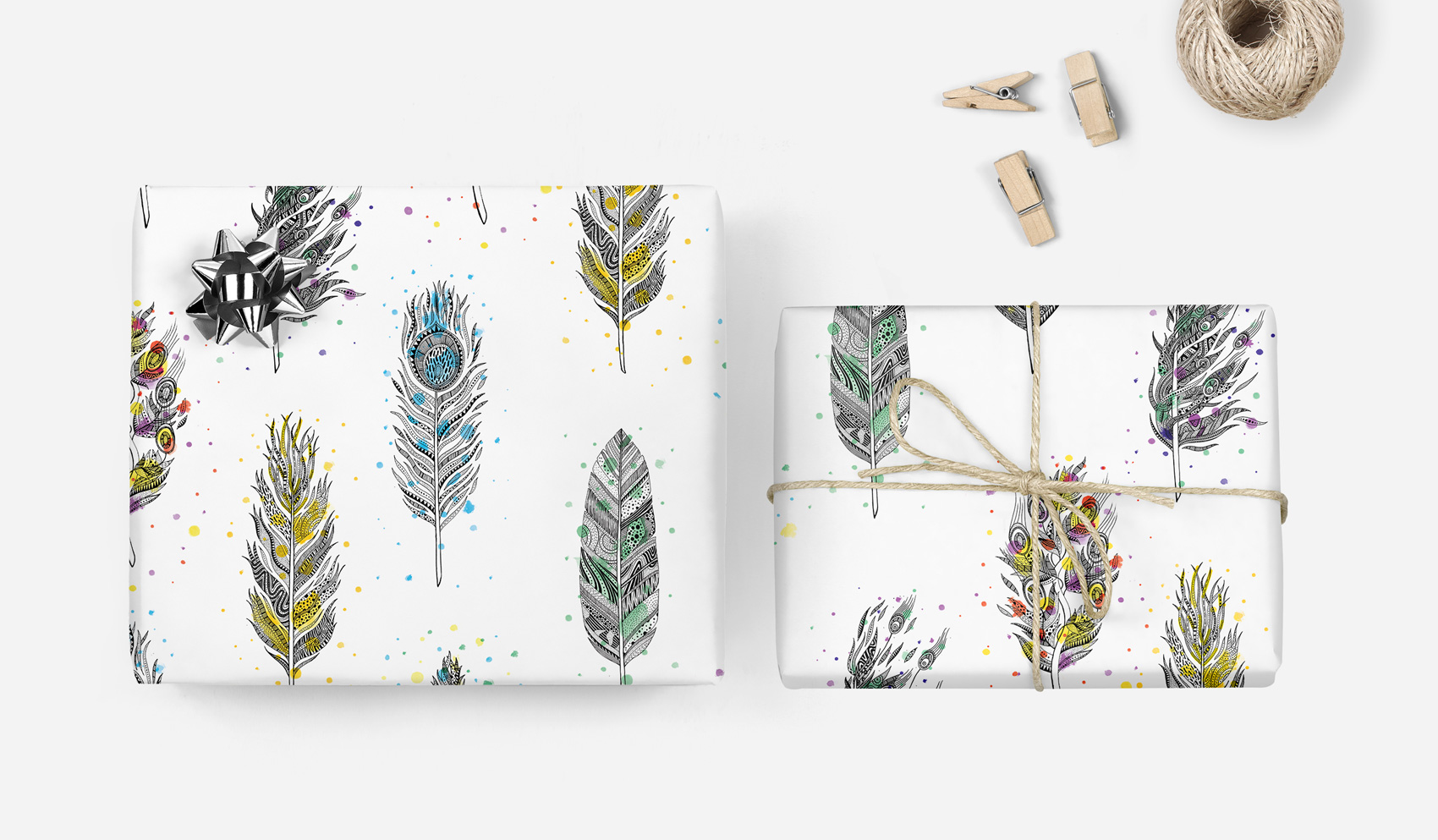 Illustrated feather pattern gift wrap with watercolor specs.